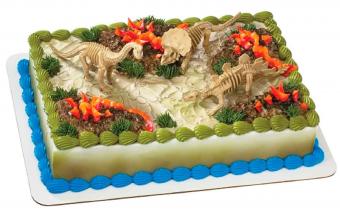 https://cf.ltkcdn.net/cake-decorating/images/slide/161210-850x540r1-DinosaurSkeletonCakeTopper.jpg
