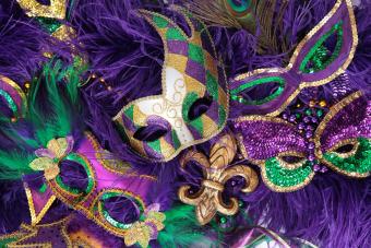 https://cf.ltkcdn.net/costumes/images/slide/247770-850x567-purple-mardi-gras-masks.jpg